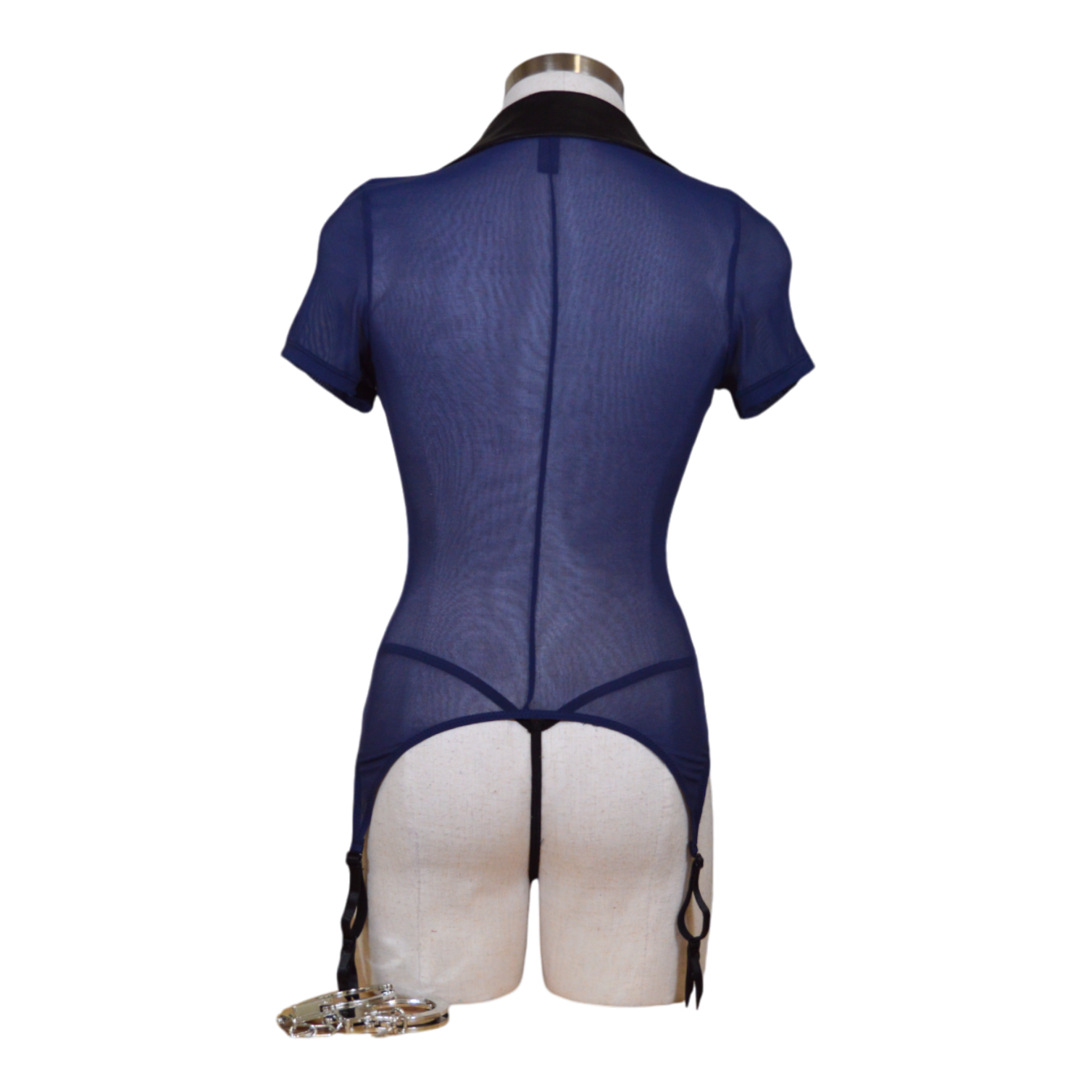 Stretch mesh garter slip bedroom costume featuring sexy zipper, faux leather collar, police badge, and cuffs. Back view.