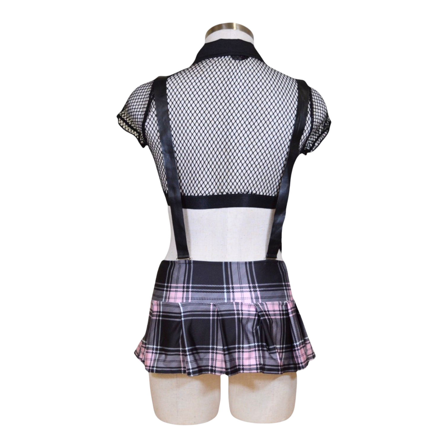 A set of women's lingerie featuring a fishnet crop top with a collared neckline and front button closure, accompanied by a plaid pleated skirt and removable leather suspenders.