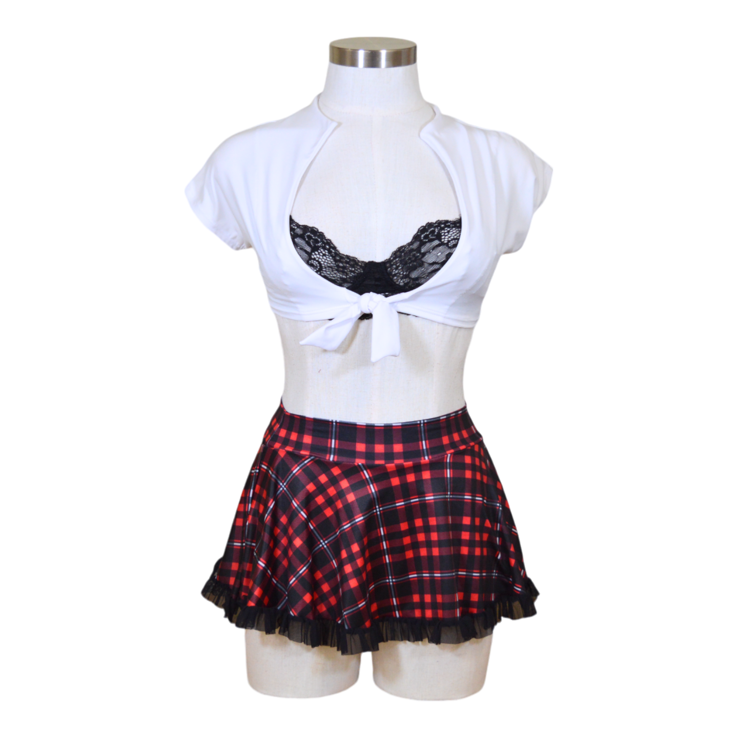 A mannequin wearing a flirty outfit with a lace bra, white tie shirt, and red plaid skirt.