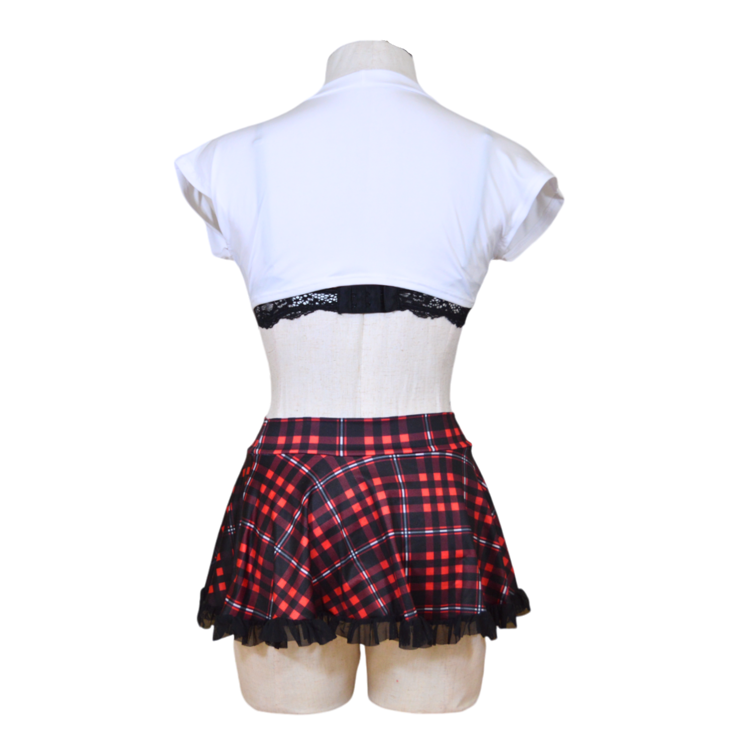 A mannequin wearing a flirty outfit with a lace bra, white tie shirt, and red plaid skirt.