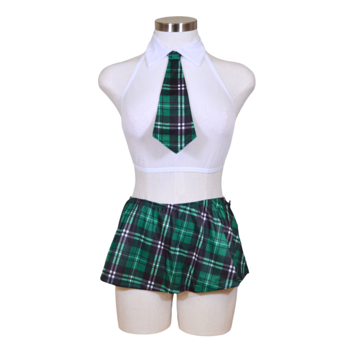 A mannequin displaying a school uniform, consisting of a white halter top, a green plaid skirt, and a green plaid tie, front view.