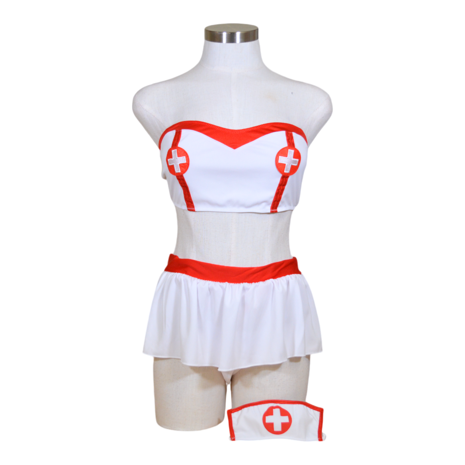 A white and red lingerie  nurse costume set including a bra with heart patterns, a skirt, and a hat, displayed on a mannequin.