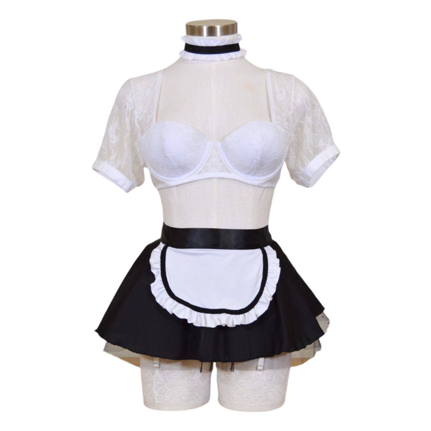 French maid white lace top and black apron on a mannequin against a white background
