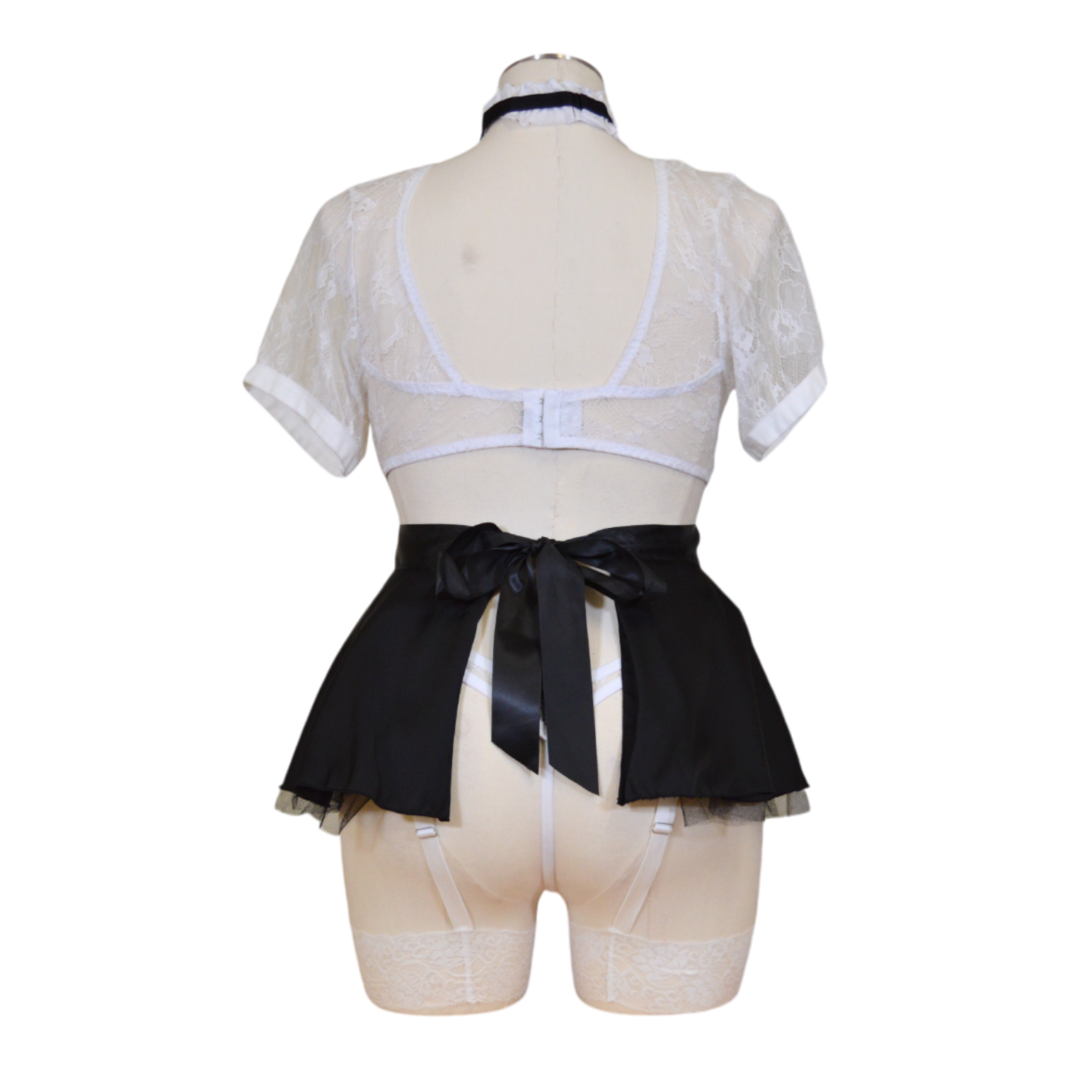 French maid white lace top and black apron on a mannequin against a white background back view.
