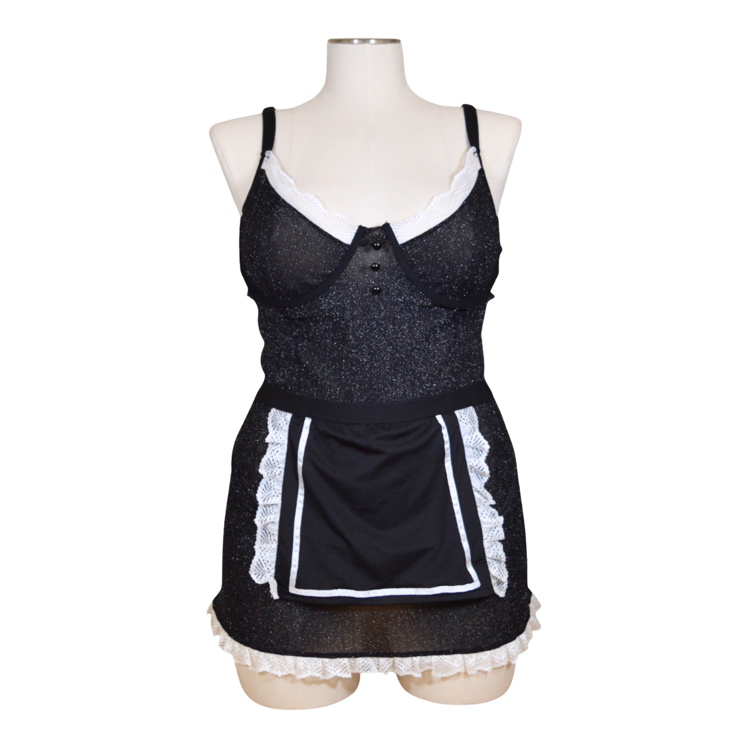 A black and white lingerie set including a chemise with apron detail, underwire cups, hook-and-eye back closure, a G-string panty, and a ruffle choker.