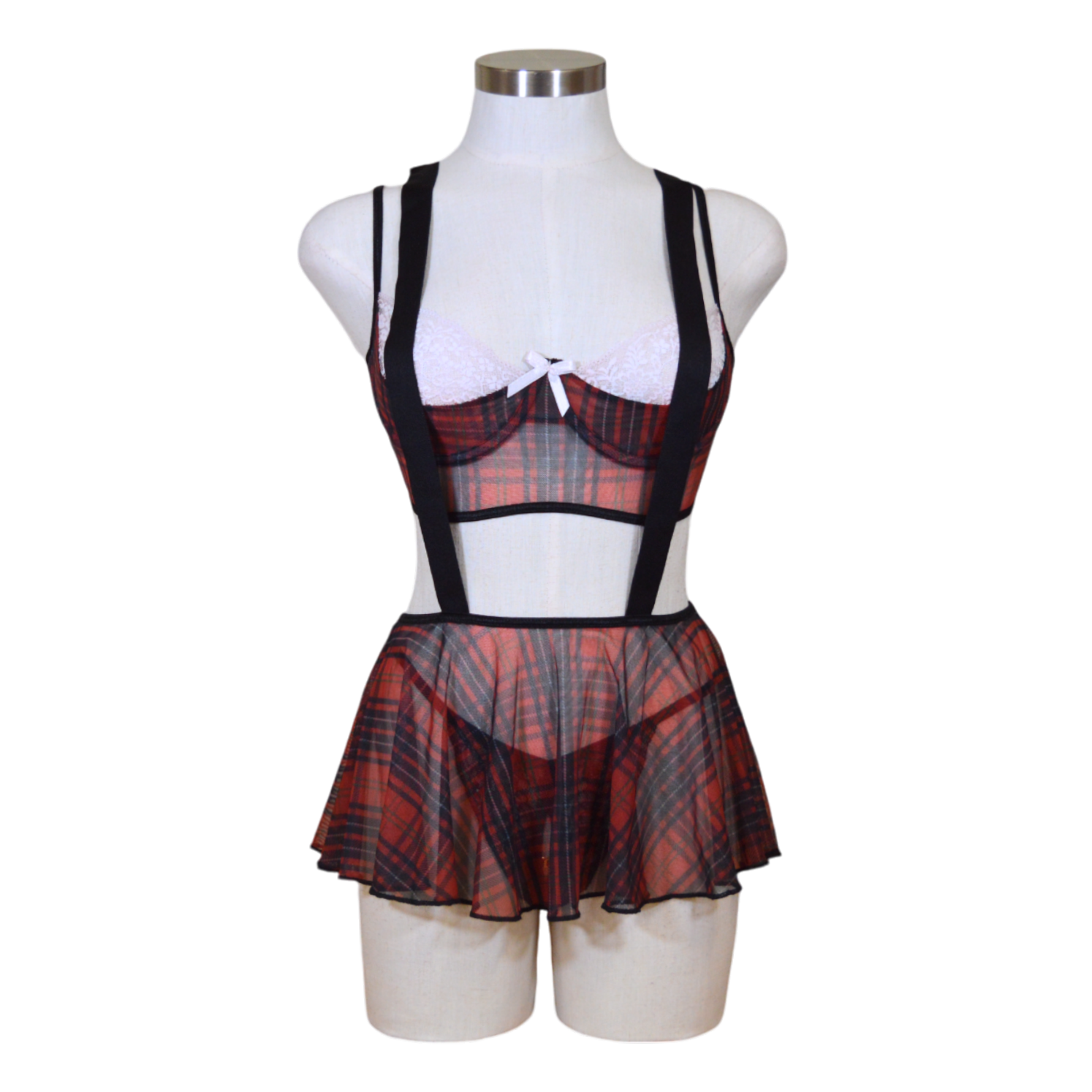 A mannequin displaying a sexy school girl costume set, including a plaid skirt and suspenders on a mannequin.